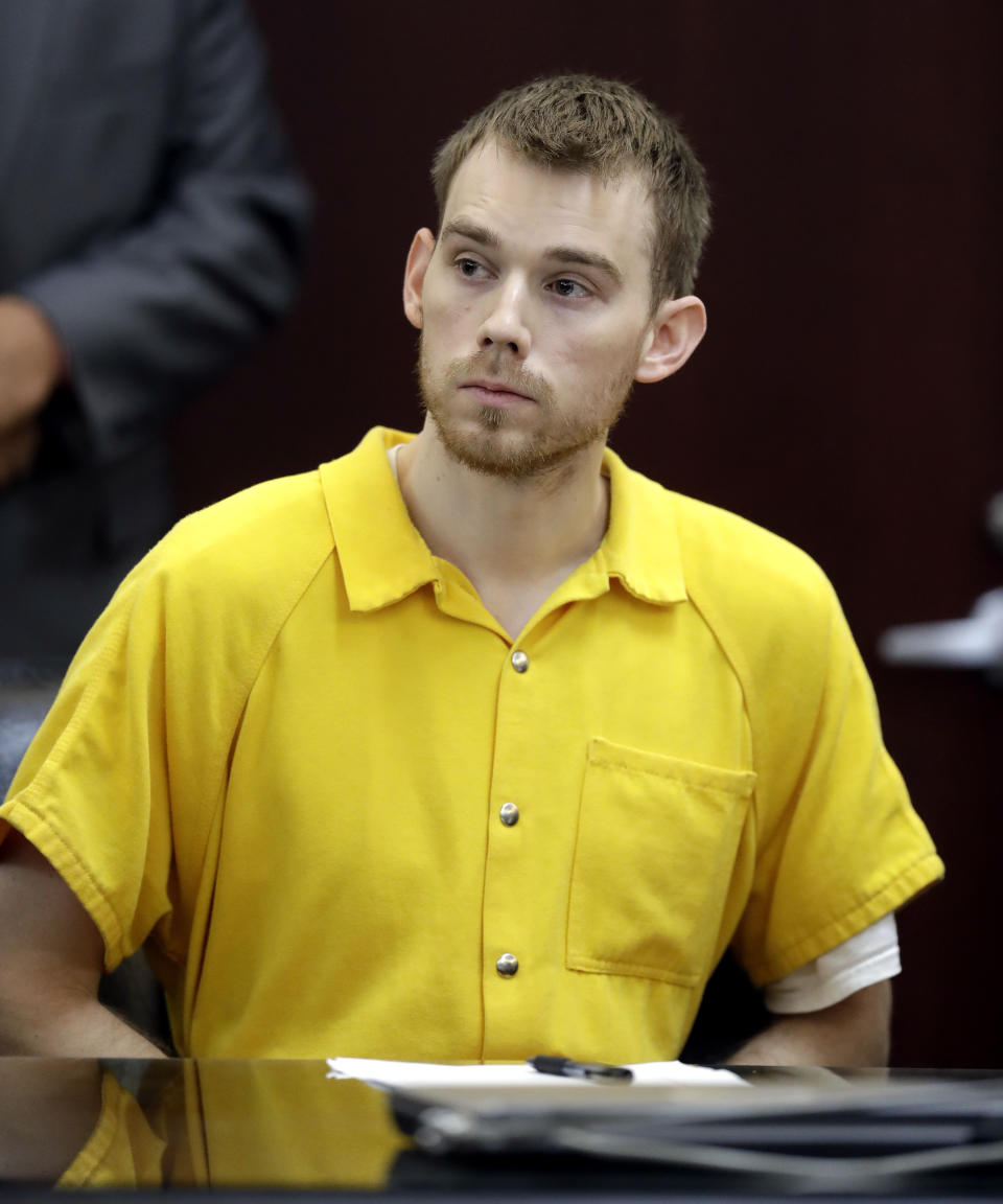 Travis Reinking appears at a hearing Wednesday, Aug. 22, 2018, in Nashville, Tenn. Reinking is charged with killing four people during a shooting at a Waffle House restaurant in Nashville in April. (AP Photo/Mark Humphrey)