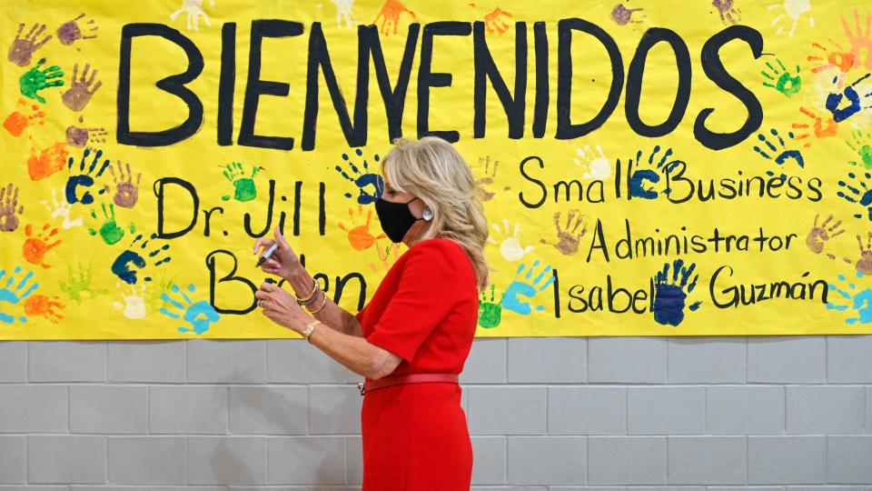First lady Jill Biden put away a marker after signing a poster at El Centro Academy, a dual-language school, as part of a tour of Hispanic organizations during Hispanic Heritage Month, Oct. 12, 2021, in Kansas City, Kan.