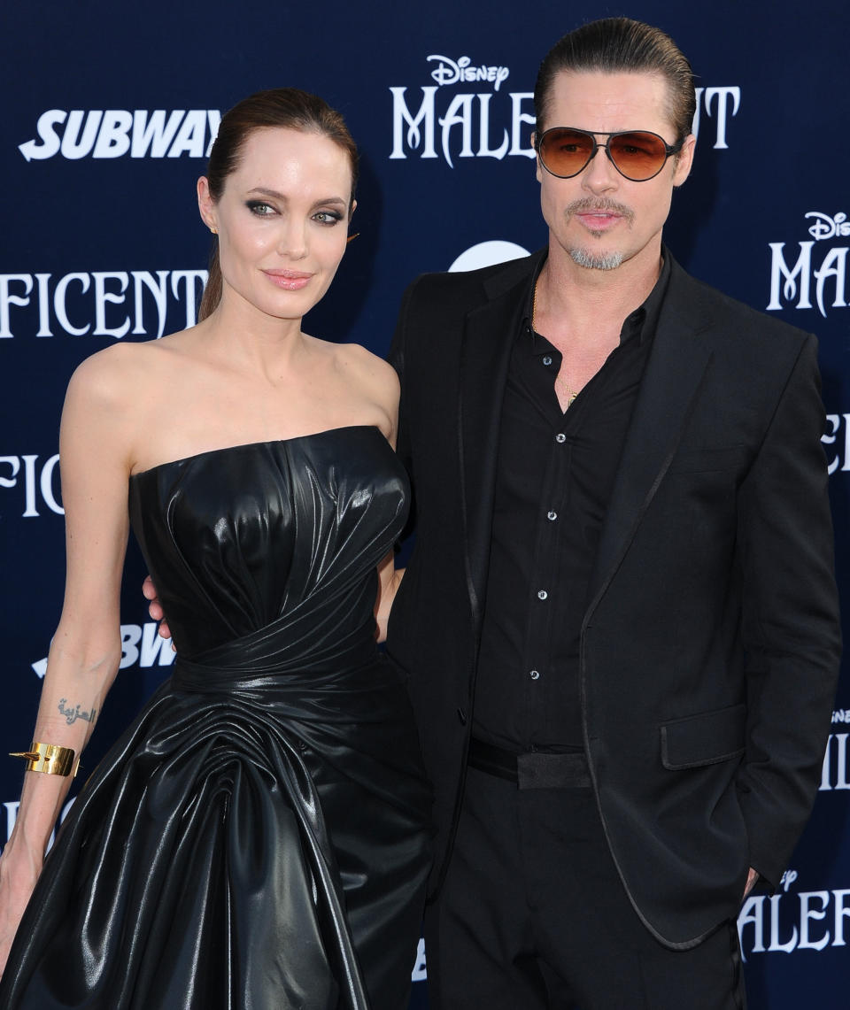HOLLYWOOD, CA - MAY 28:  Angelina Jolie and Brad Pitt arrives at the World Premiere Of Disney's "Maleficent" at the El Capitan Theatre on May 28, 2014 in Hollywood, California.  (Photo by Steve Granitz/WireImage)