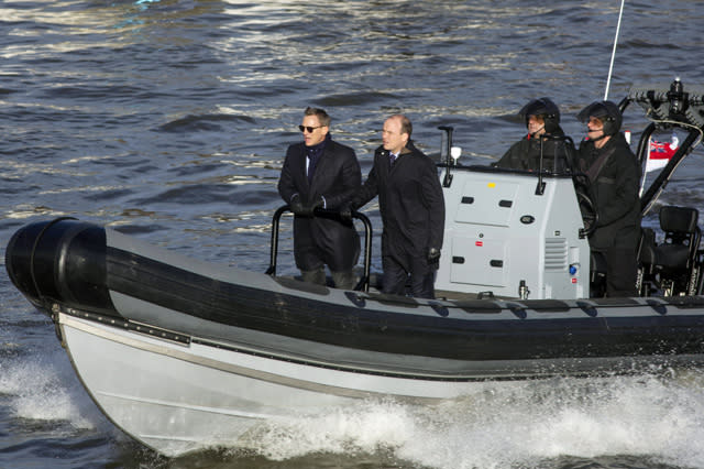 Mandatory Credit: Photo by REX Shutterstock (4301783r) Daniel Craig and Rory Kinnear James Bond 'Spectre' on location filming, London, Britain - 15 Dec 2014 Daniel Craig has been spotted back in character as James Bond as shooting for the 24th film ?Spectre? took place on the Thames in London today. The actor was seen in the back of a black speedboat accompanied by Rory Kinnear, who plays MI6's Bill Tanner. Both men were wearing suits and dark coats and in between takes they grinned delightedly as they zipped along the water. Daniel was also spotted giving watching fans a wave and a thumb's up. 