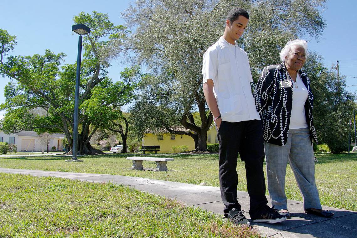 On March 1, 2010, Leona Cooper, with her grandson Carlin Cooper, walks through a Coral Gables park that was to be named after her husband William A. Cooper.  