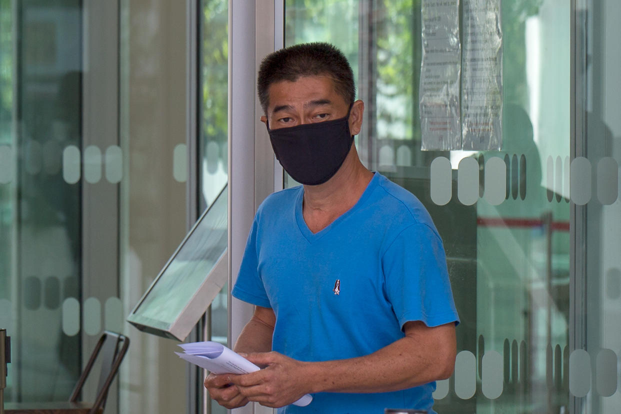 Chong Chun Wah, 47, seen leaving the State Courts after being charged on 21 April 2020.  (PHOTO: Dhany Osman / Yahoo News Singapore)