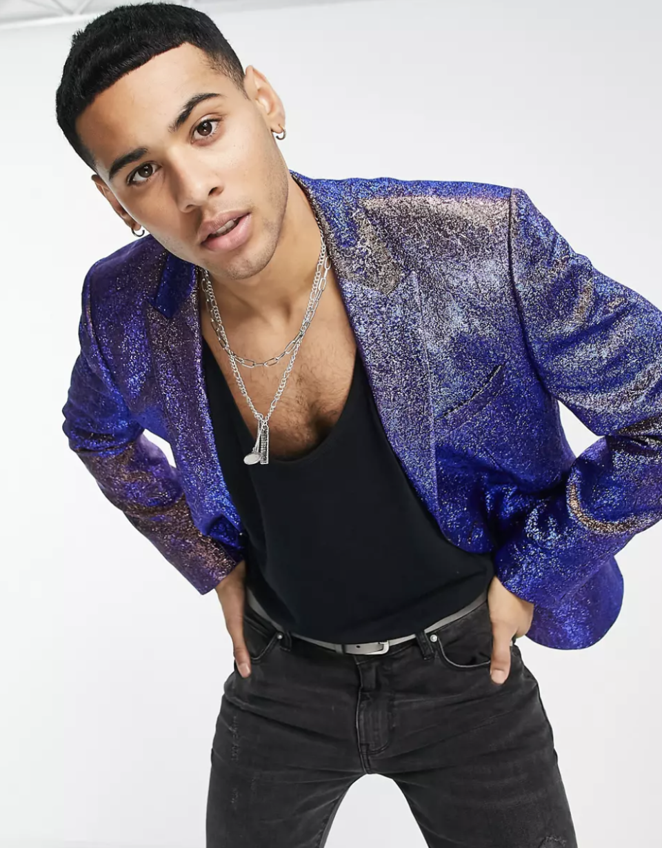 <p><strong>ASOS DESIGN </strong></p><p>asos.com</p><p><strong>$77.50</strong></p><p>Lesson learned: let your blazer do the talking if it's as shiny and wear it over a T-shirt. Your favorite chain will pull the whole look together.</p>