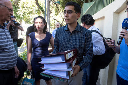 Juan Carlos Claret, spokesperson of Laicos de Osorno, a group that protests Juan Barros' appointment as Bishop, is seen before a meeting with the Vatican special envoy, Archbishop Charles Scicluna, in Santiago, Chile February 21, 2018. Picture taken February 21, 2018 REUTERS/Claudio Santana NO RESALES. NO ARCHIVE.