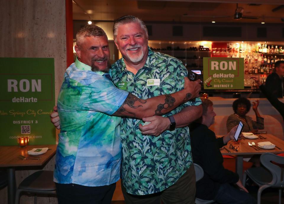 Ron deHarte, right, takes a photo with Jim Ginelli on election night in Palm Springs.