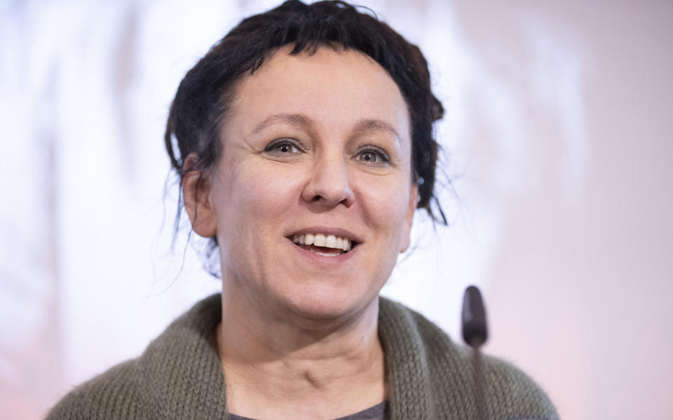 Polish author Olga Tokarczuk attends a press conference in Bielefeld, Germany, Thursday, Oct 10, 2019. Olga Tokarczuk is named recipient of the 2018 Nobel Prize in Literature, Thursday Oct. 10, 2019. Two Nobel Prizes in literature are announced Thursday after the 2018 literature award was postponed following sex abuse allegations that rocked the Swedish Academy at that time. (Friso Gentsch/dpa via AP)