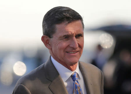 FILE PHOTO - U.S. National Security Advisor Michael Flynn boards Air Force One at West Palm Beach International airport in West Palm Beach, Florida U.S. on February 12, 2017. REUTERS/Carlos Barria/File Photo