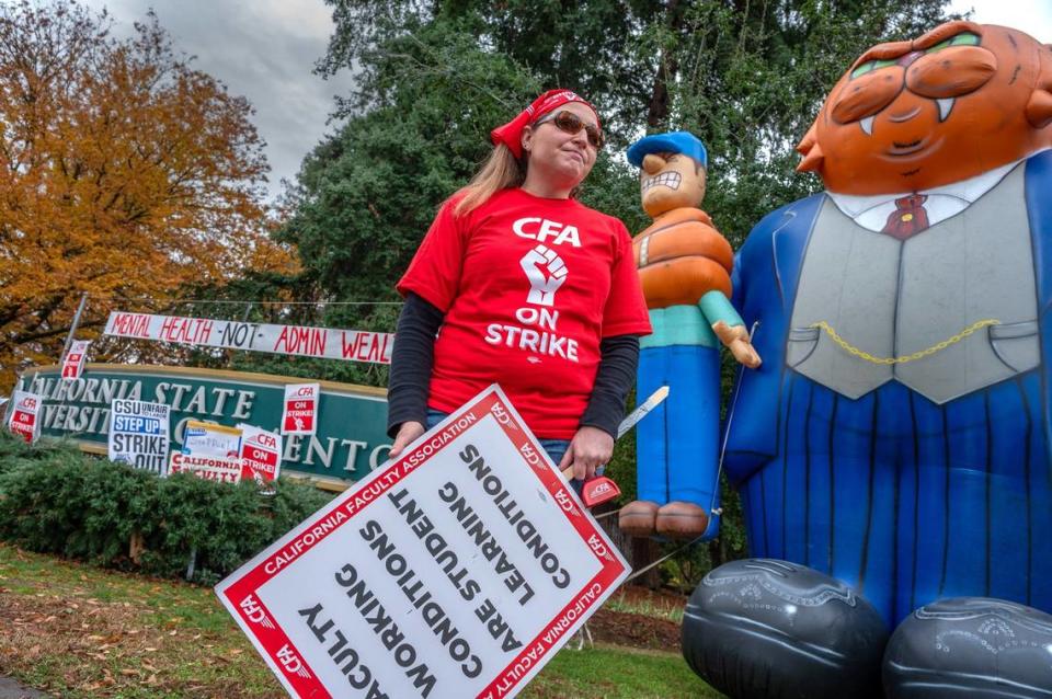 Sacramento State sociology lecturer Danielle Duckett joins hundreds on the picket line of a one-day rolling strike at CSUS on Thursday, Dec. 7, 2023. The California Faculty Association on Monday Feb. 19, 2024, announced its members voted to approve a new contract with the CSU.