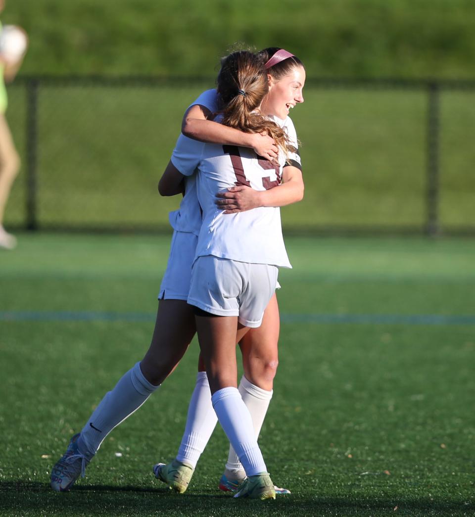 New Paltz's Leah Schamberg and Fiona O'Hara celebrate after a goal during a Section 9 Class A girls soccer semifinal on Oct. 28, 2021.