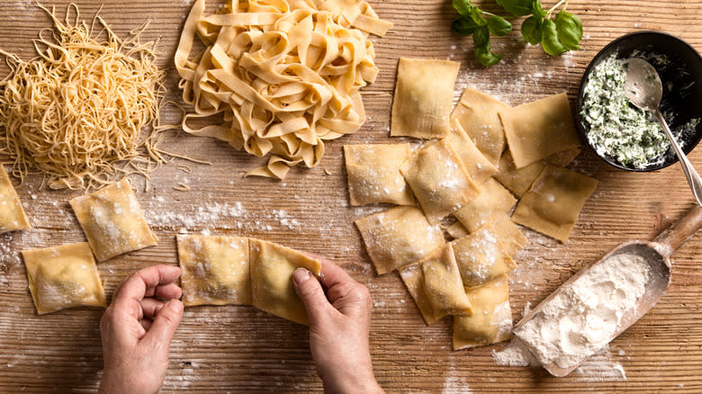 chef making multiple shapes of pasta 