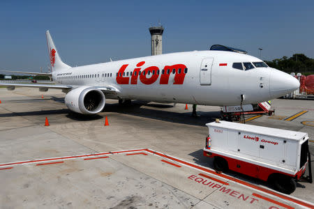 FILE PHOTO: Lion Air's Boeing 737 Max 8 airplane is parked on the tarmac of Soekarno Hatta International airport near Jakarta, Indonesia, March 15, 2019. REUTERS/Willy Kurniawan/File Photo