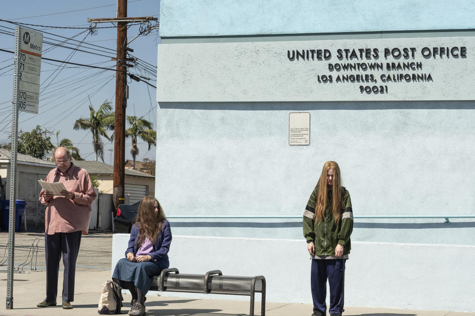 This image released by Focus Features shows Evan Rachel Wood, from right, Debra Winger and Richard Jenkins in a scene from "Kajillionaire." (Matt Kennedy/Focus Features via AP)