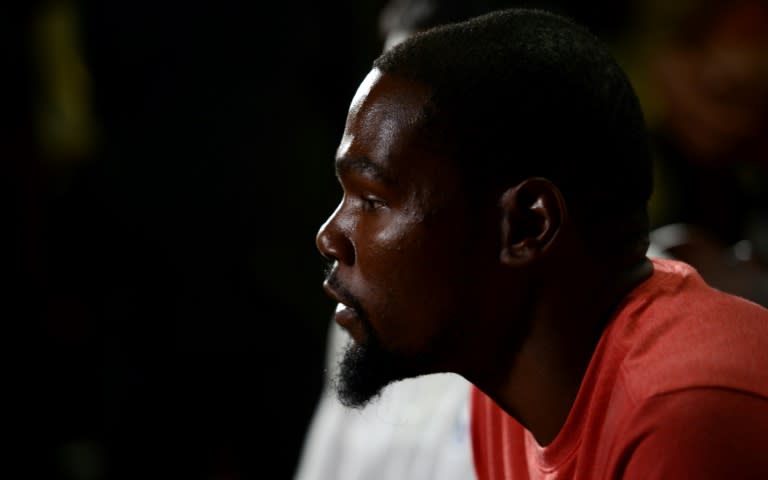 NBA Finals MVP Kevin Durant was caught out on Twitter after using his official account on the social media site to reply to comments from a fan asking why he had left Oklahoma City