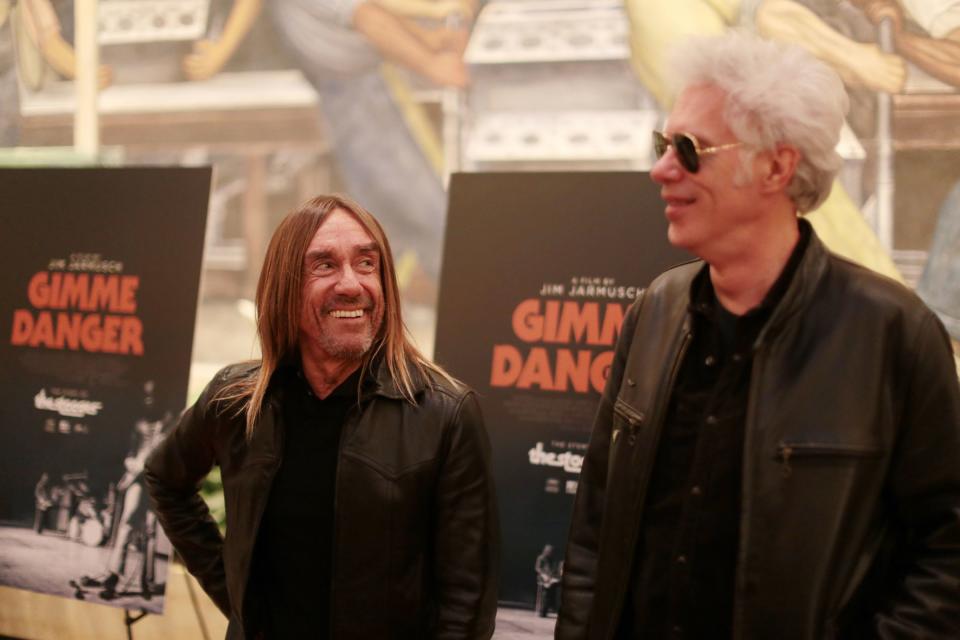 Director Jim Jarmusch and Iggy Pop walk the red carpet before the screening of Jarmuschâ€™s new Stooges documentary 'Gimme Danger' at the Detroit Film Theatre at the Detroit Institute of Arts on Tuesday October 25, 2016.