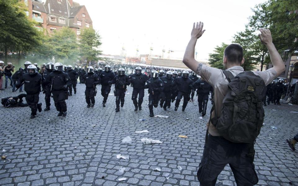 This is not the image Mrs Merkel was hoping to show the world - Credit: EPA/MASSIMO PERCOSSI 