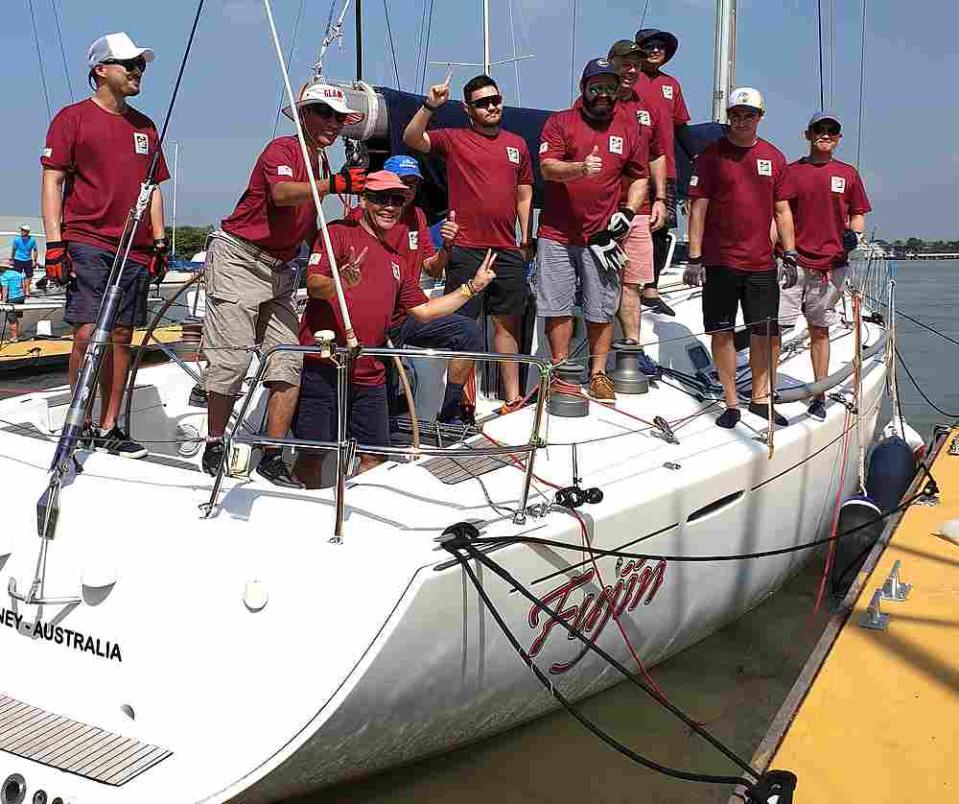 Raja Muda Selangor Tengku Amir Shah (fifth from left) and the ‘Fujin’ (Jeff Harris) crew pose at the Royal Selangor Yacht Club before heading to the start line for the first RMSIR passage race. — Picture courtesy of Beverly Hon