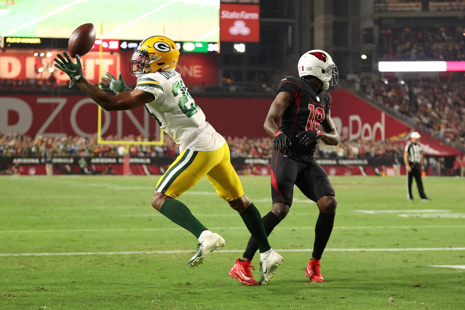 GLENDALE, ARIZONA - OCTOBER 28: Rasul Douglas #29 of the Green Bay Packers intercepts a pass intended for A.J. Green #18 of the Arizona Cardinals during the fourth quarter of a game at State Farm Stadium on October 28, 2021 in Glendale, Arizona. The Packers defeated the Cardinals 24-21. (Photo by Christian Petersen/Getty Images)