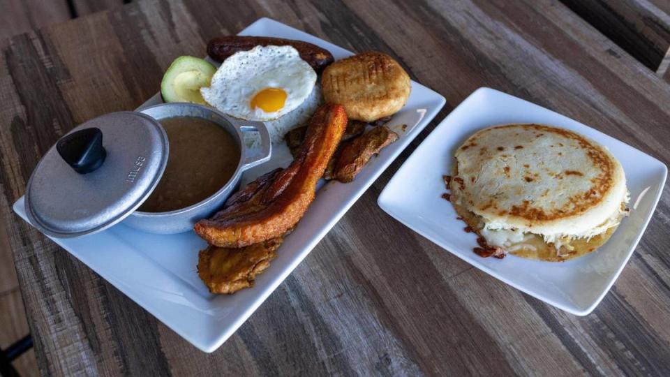 A bandeja paisa dish and an arepa from The Colombian Corner restaurant in Lawrenceburg. These traditional dishes from the Andean region include beef, beans, plantain, chicharron, avocado and more.