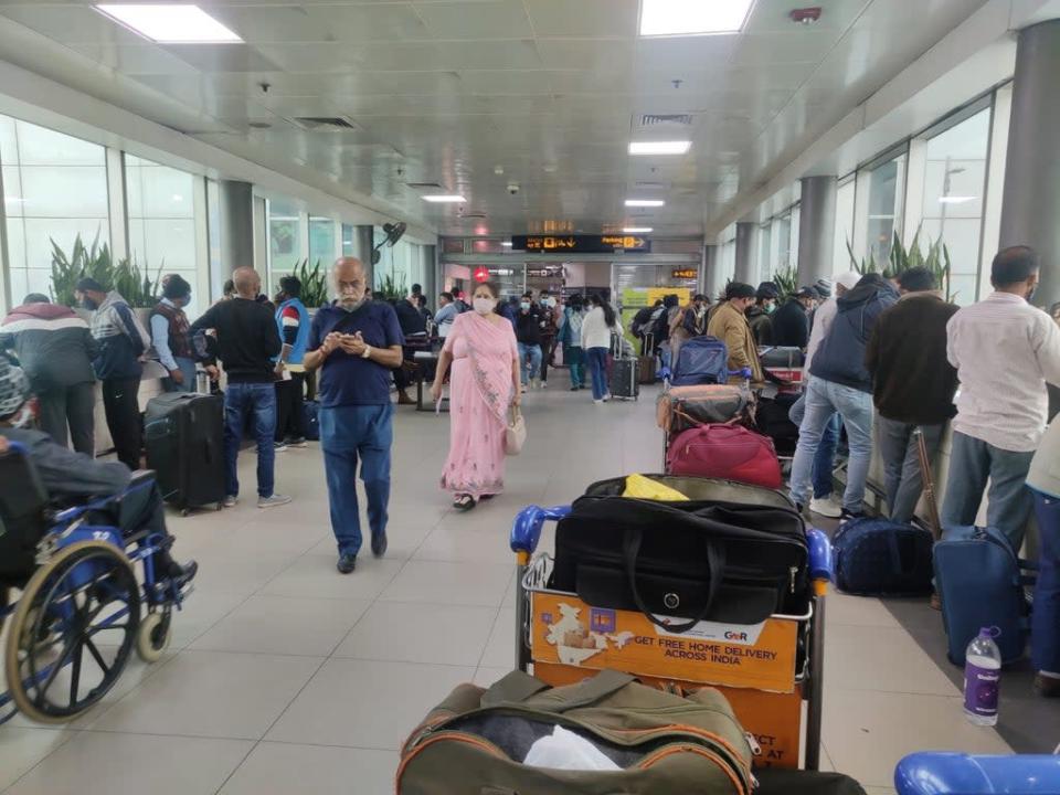 Passengers filing the forms to undertake RT-PCR test in the complex adjoining T3 Terminal of Indira Gandhi International Airport (Namita Singh)