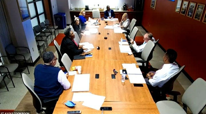 Fayetteville City Councilman Johnny Dawkins, pointing, has a heated exchange with councilwoman Yvonne Kinston during an appointments committee meeting on Nov. 9, 2021.