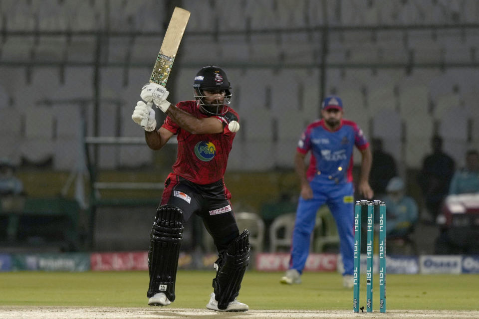 Lahore Qalandars' Fakhar Zaman plays a shot during the Pakistan Super League T20 cricket match between Lahore Qalandars and Karachi Kings, in Karachi, Pakistan, Saturday, March 9, 2024. (AP Photo/Fareed Khan)