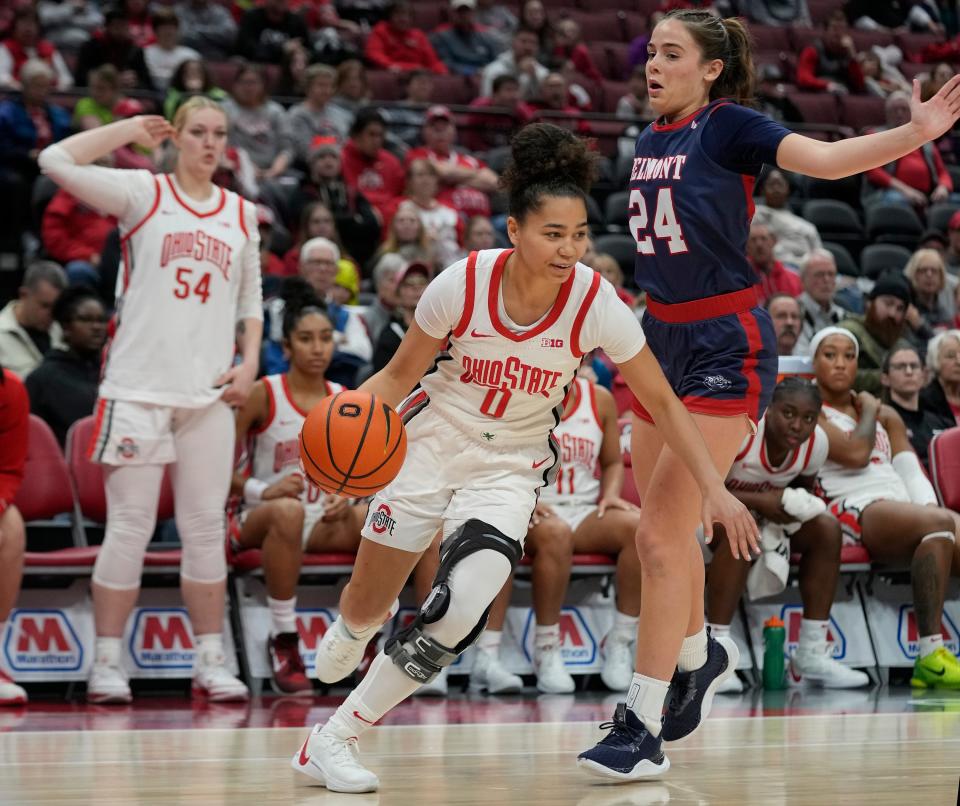 Dec 22, 2023; Columbus, OH, USA; Ohio State Buckeyes guard Madison Greene (0) works around Belmont Bruins guard Kate Hollifield (24) in the second half of their NCAA Womens Division I Basketball game against the Belmont Bruins at Value City Arena.