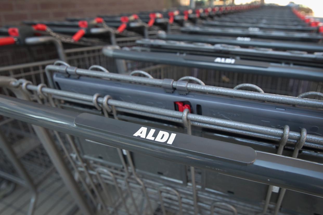 shopping carts sit outside an Aldi grocery store on June 12, 2017 in Chicago
