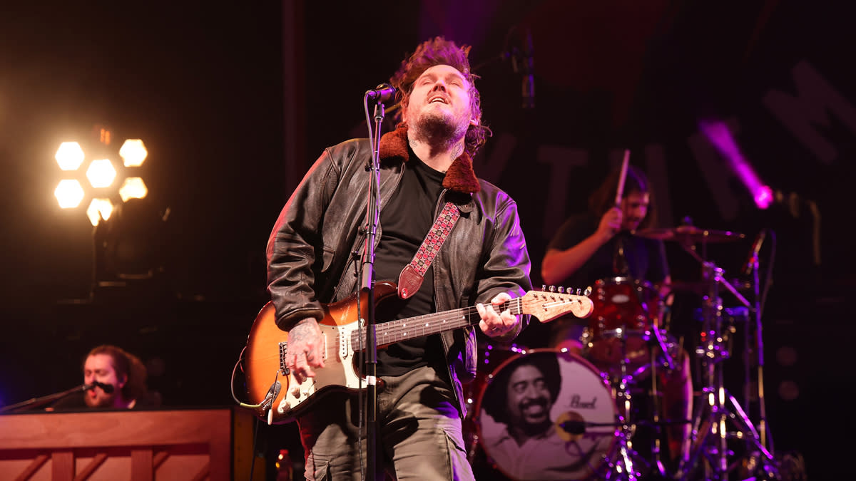  Bryan Haring, Brian Fallon, and Benny Horowitz of The Gaslight Anthem perform at PNC Bank Arts Center on October 08, 2022 in Holmdel, New Jersey. 