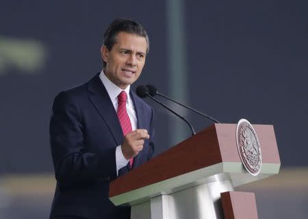 Mexico's President Enrique Pena Nieto speaks during a military parade in celebration of the 104th anniversary of the Mexican Revolution, at Campo Marte in Mexico City in this November 20, 2014 file photo. REUTERS /Henry Romero/Files