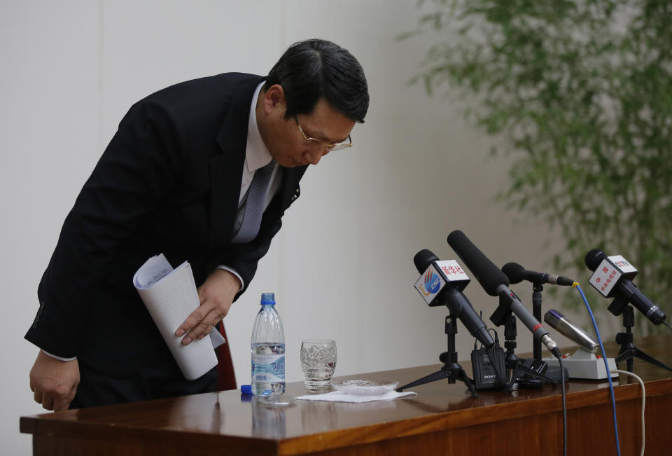 Kim Jung Wook, a South Korean Baptist missionary, bows before he leaves a news conference in Pyongyang, North Korea, Thursday, Feb. 27, 2014. Kim who was arrested more than four months ago for allegedly trying to establish underground Christian churches in North Korea told reporters Thursday he is sorry for his "anti-state" crimes and appealed to North Korean authorities to show him mercy by releasing him from their custody. (AP Photo/Vincent Yu)