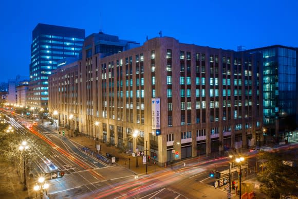 Exterior of Twitter HQ at night.