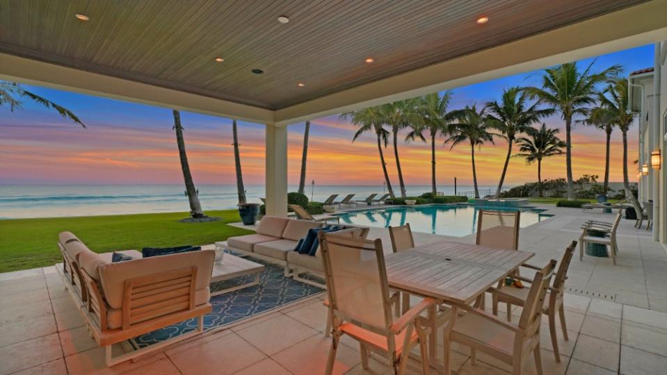 An outdoor kitchen and dining area - Credit: Cliff Finley, Picture It Sold Photography