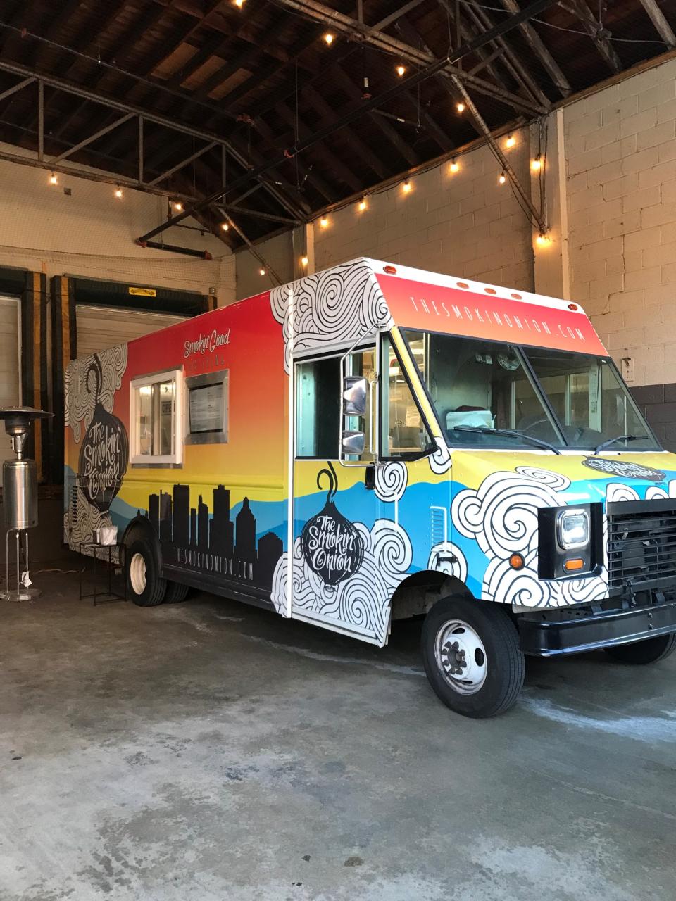 The Smokin’ Onion Food Truck parked at Ginger's Revenge in Asheville.