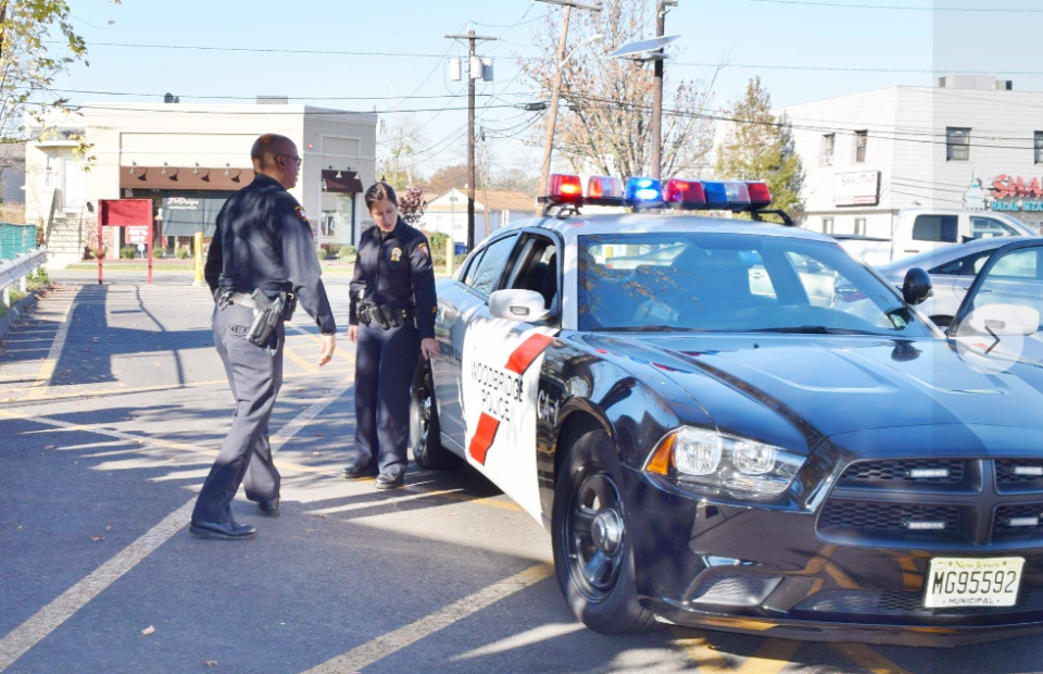 Woodbridge Police Department officers at a scene in New Jersey. The agency is investigating after a dog attacked a 3-year-old baby boy and killed him on March 9, 2024.