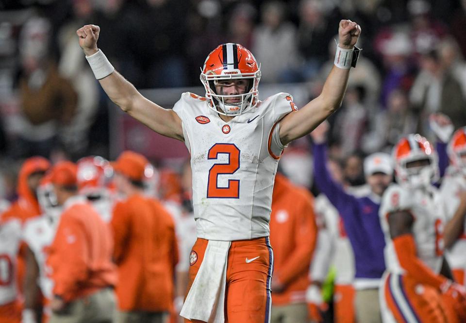 Clemson quarterback Cade Klubnik (2) raises his arms after the team's 16-7 win over South Carolina at Williams-Brice Stadium on Nov. 25. Klubnik has thrown for 2,580 yards and 19 touchdowns this season.