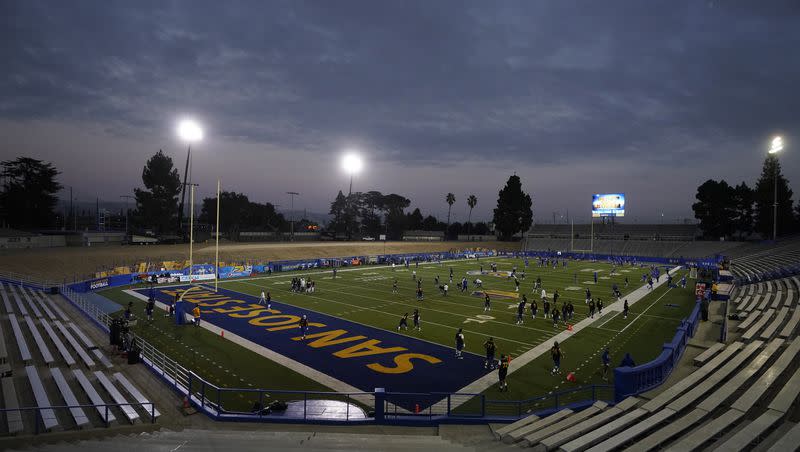 Players warm up at CEFCU Stadium before of an NCAA college football game between San Jose State and Air Force in San Jose, Calif., on Oct. 24, 2020.