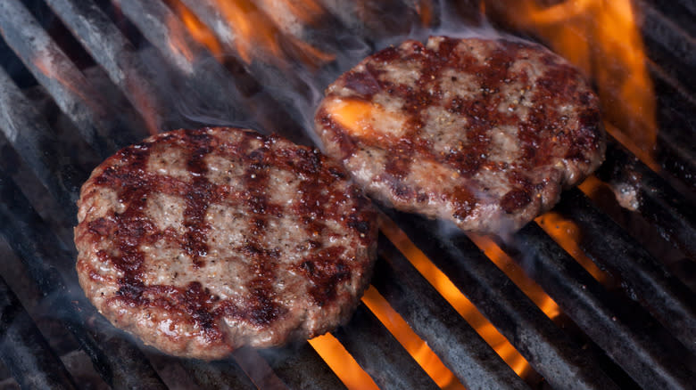 burger patties on grill