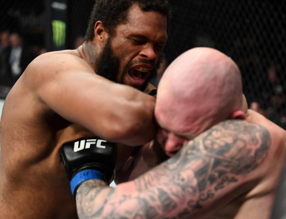 (L-R) Maurice Greene lands an elbow to the head of Jeff Hughes in their heavyweight bout during the UFC Fight Night event at Intrust Bank Arena on March 9, 2019 in Wichita, Kansas. (Photo by Josh Hedges/Zuffa LLC/Zuffa LLC via Getty Images)