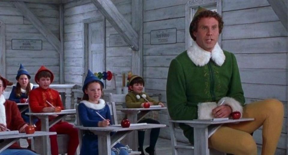 Will Ferrell in the school room with fellow children elves in the festive film Elf 