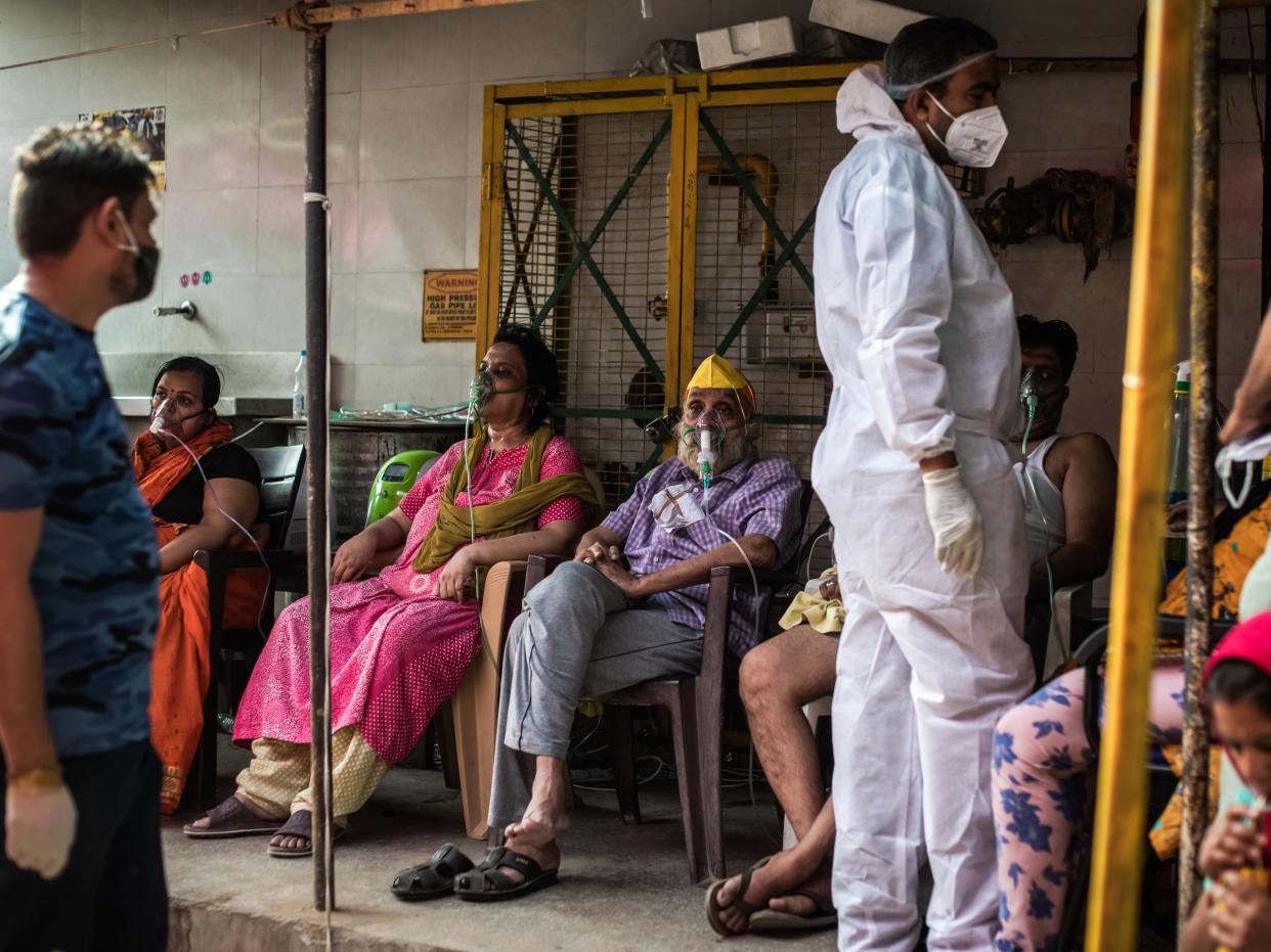 Patients suffering from Covid-19 are treated with free oxygen at a makeshift clinic in Indirapuram, Uttar Pradesh (Rebecca Conway/Getty Images)