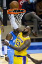 Los Angeles Lakers forward LeBron James (23) shoots against the Houston Rockets during an NBA basketball game Tuesday, Jan. 12, 2021, in Houston. (Mark Mulligan/Houston Chronicle via AP)