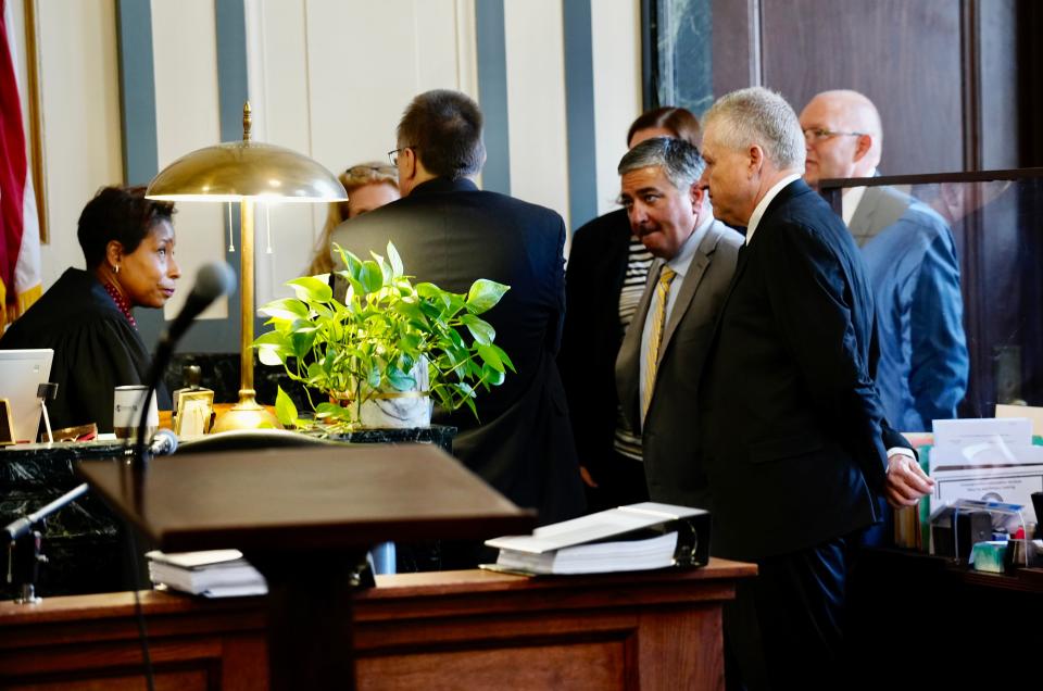 Hamilton County Common Pleas Judge Wende Cross speaks with prosecutors and attorneys for the start the aggravated murder trial against John and Katherine Snyder in the death of their adopted son in 2016, at the Hamilton County Courthouse on Friday.