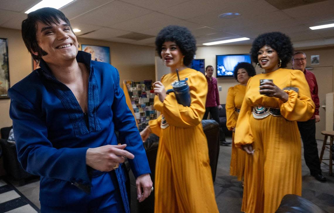 Victor Trevino Jr., an Elvis tribute artist, laughs with his co-stars Alyssa Byers, Jessica Brooke Seals, and Cherise Coaches after coming off the stage from the first set where he stars with the women in “Elvis: Aloha from Vegas,” a tribute concert, at the New Theatre in Overland Park. The women portray Elvis Presley’s backup singers the “Sweet Inspirations.”