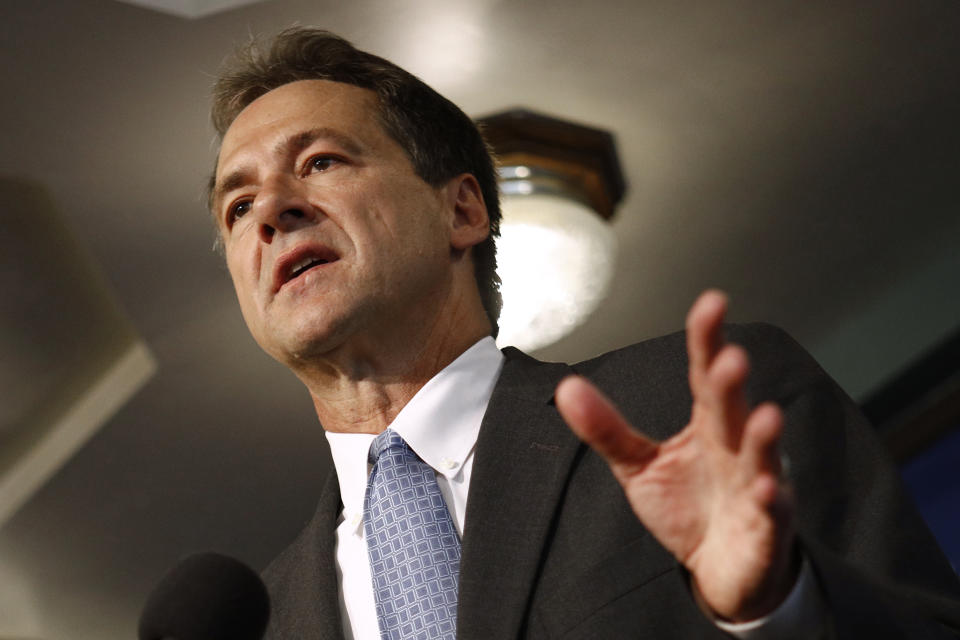 FILE - In this Aug. 7, 2019, file photo, Montana Gov. Steve Bullock speaks at the National Press Club in Washington. Major construction projects moving forward along the U.S. borders with Canada and Mexico amid the coronavirus pandemic are raising fears workers could spread infections within nearby communities including several Native American tribes. Bullock said that could further strain rural health systems facing the coronavirus. (AP Photo/Patrick Semansky, File)