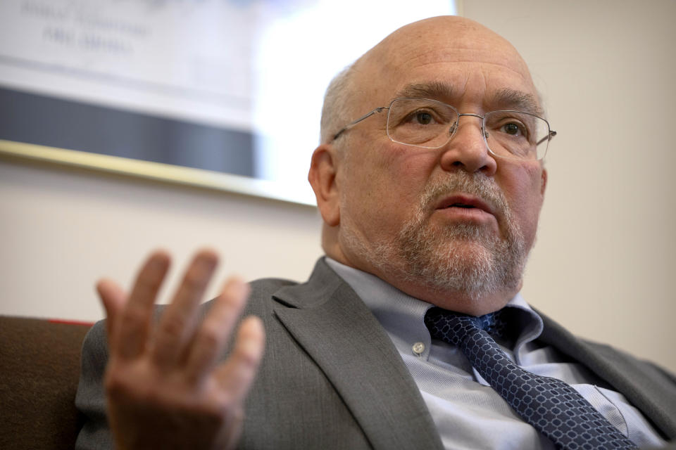 Tracy Toulou, the outgoing Director of the Office of Tribal Justice, speaks during an interview in his office at the Department of Justice, Thursday, March 14, 2024, in Washington. For more than two decades, Toulou has confronted the serious public safety challenges facing Indian Country by working to expand the power of tribal justice systems. Today, tribal law enforcement finally has a seat at the table when federal authorities coordinate with state and local police, according to the Justice Department’s point person on Native American tribes. (AP Photo/Mark Schiefelbein)