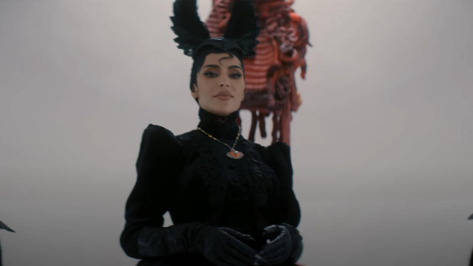 Kim Kardashian's Siobhan in black outfit with headwear on American Horror Story: Delicate