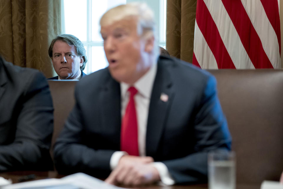 White House counsel Don McGahn, left, listens as President Trump speaks during a Cabinet meeting at the White House on Aug. 16, 2018. (Photo: Andrew Harnik/AP)