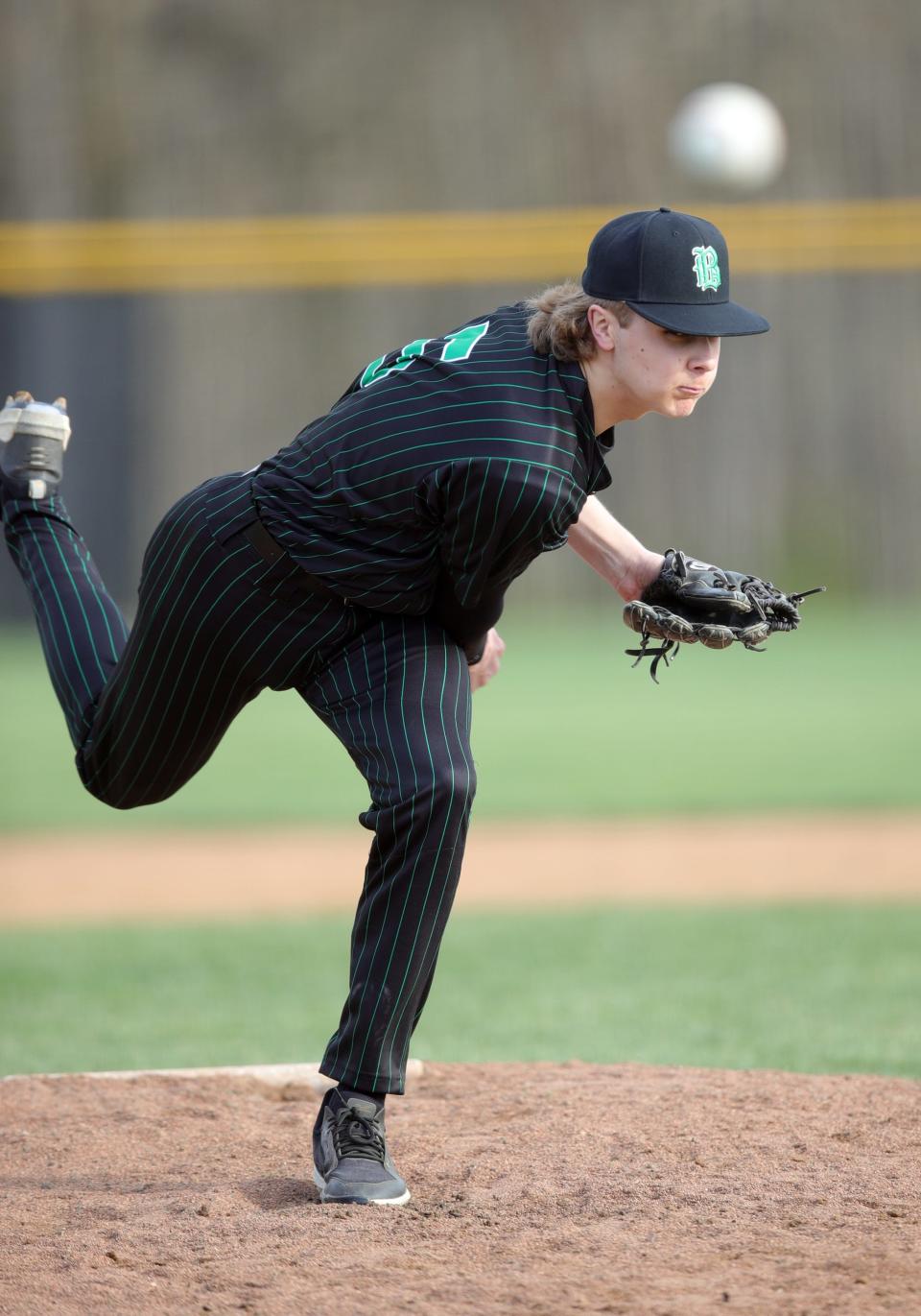 Badin starting pitcher Eric Rawlings throws a six-inning one-hit game in the game between Badin and McNicholas high schools March 30, 2022, at McNicholas High School. Badin defeated McNicholas 13-1.