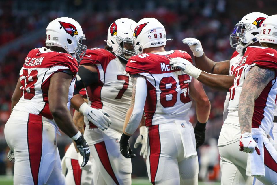 Jan 1, 2023; Atlanta, Georgia, USA; Arizona Cardinals tight end Trey McBride (85) celebrates with teammates after a touchdown against the Atlanta Falcons in the first half at Mercedes-Benz Stadium. Mandatory Credit: Brett Davis-USA TODAY Sports