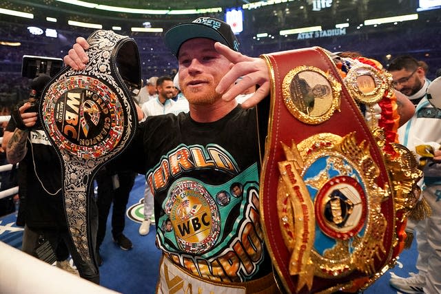 Canelo Alvarez celebrates after defeating Billy Joe Saunders in their unified super middleweight world championship boxing match